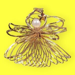 Avon 1997 Angel Gold Colored Wire Christmas Ornament Heart Swirls 3.25 inches